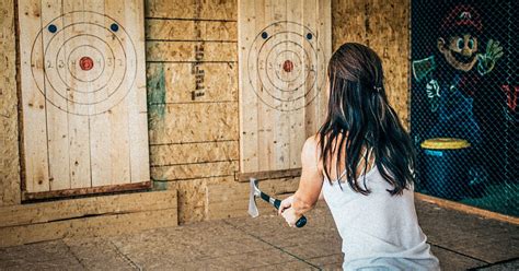 Unleash Your Inner Lumberjack: Experience the Thrill of Axe Throwing with Our Adrenaline-Pumping Business!
